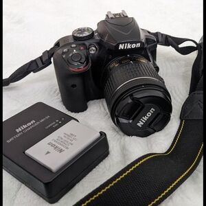 Nikon Black DSLR Camera with Lens
